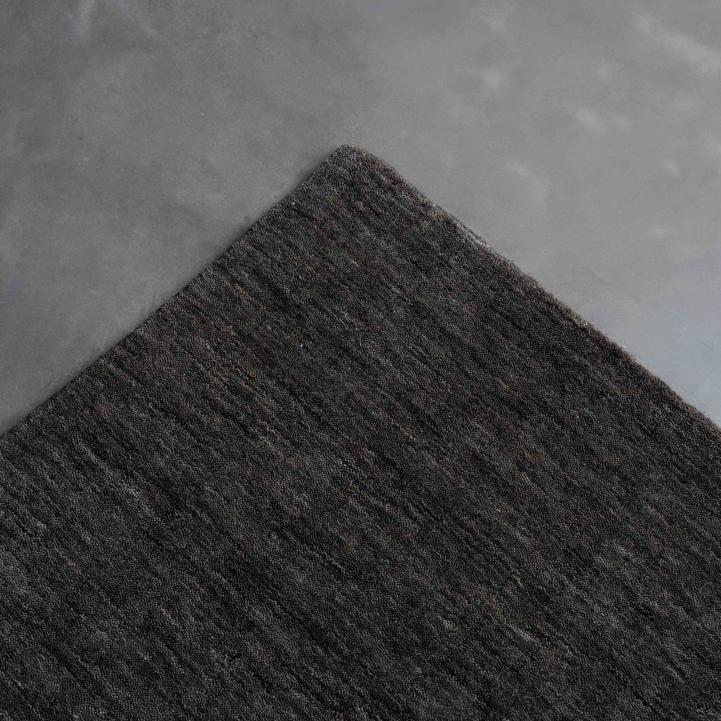 Handcrafted Black and Grey Wool Soft Rug