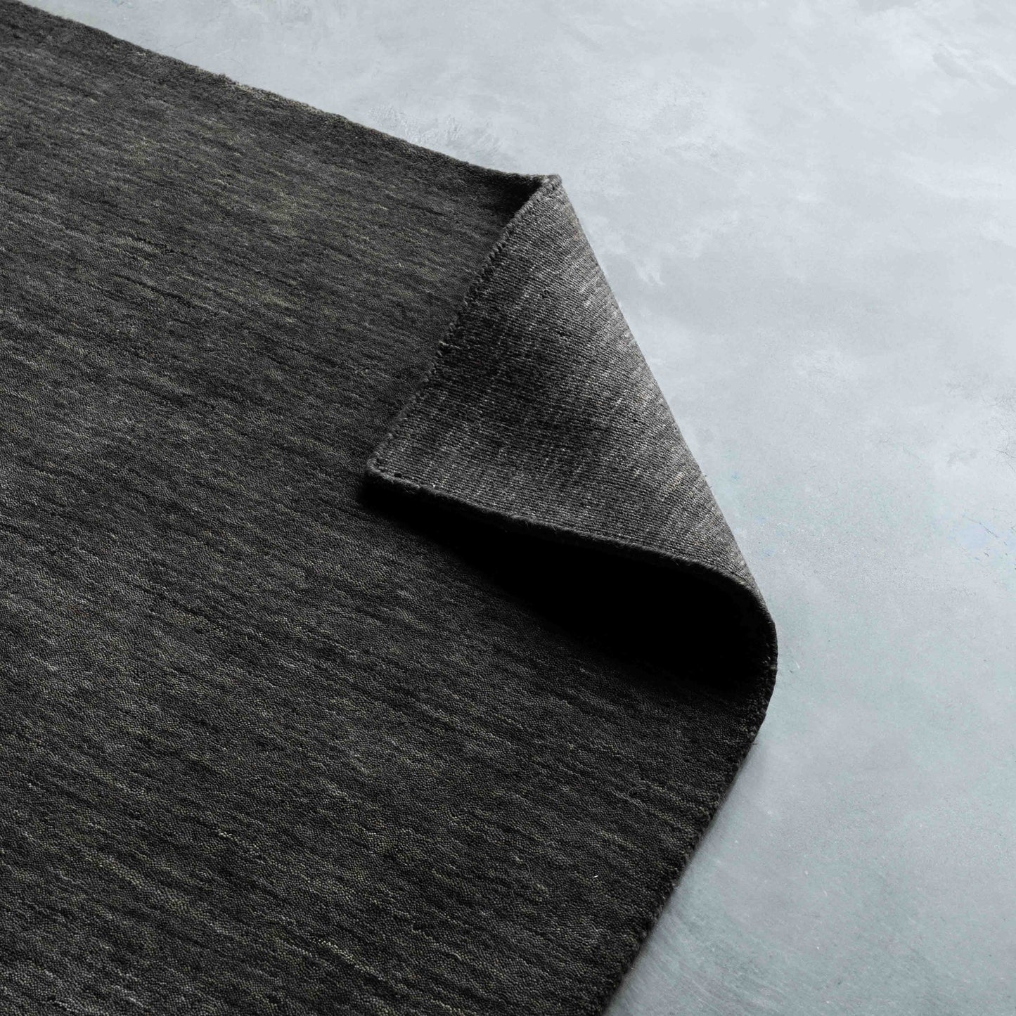 Handcrafted Black and Grey Wool Soft Rug