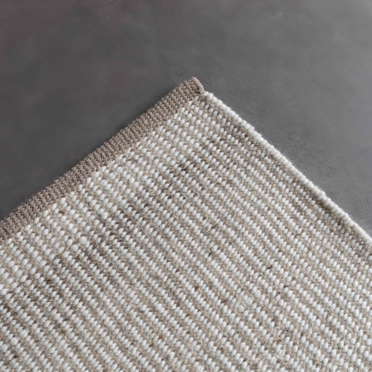 Handcrafted Silver Ivory Wool Rug