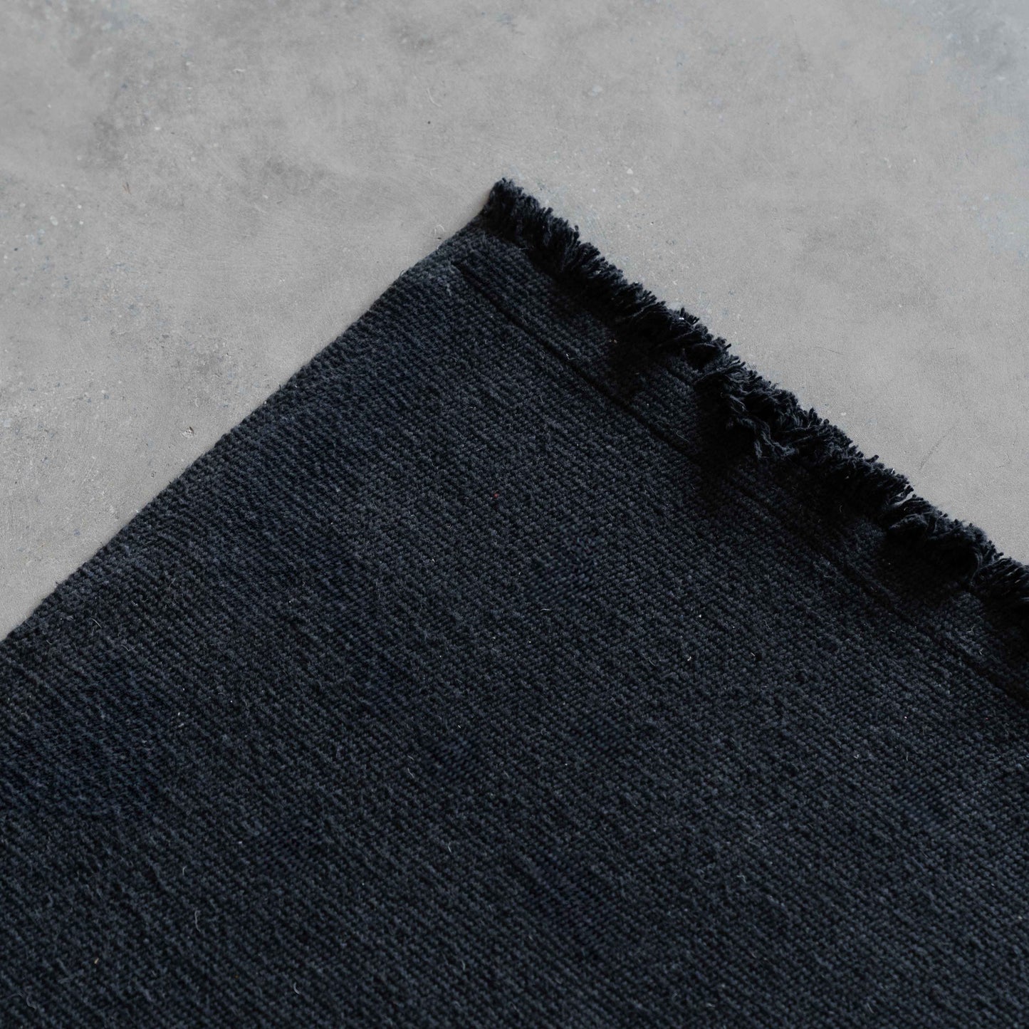 Handmade Black Wool Rug